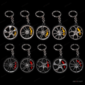 25 pcs - Rotating Alloy Wheel Keychain